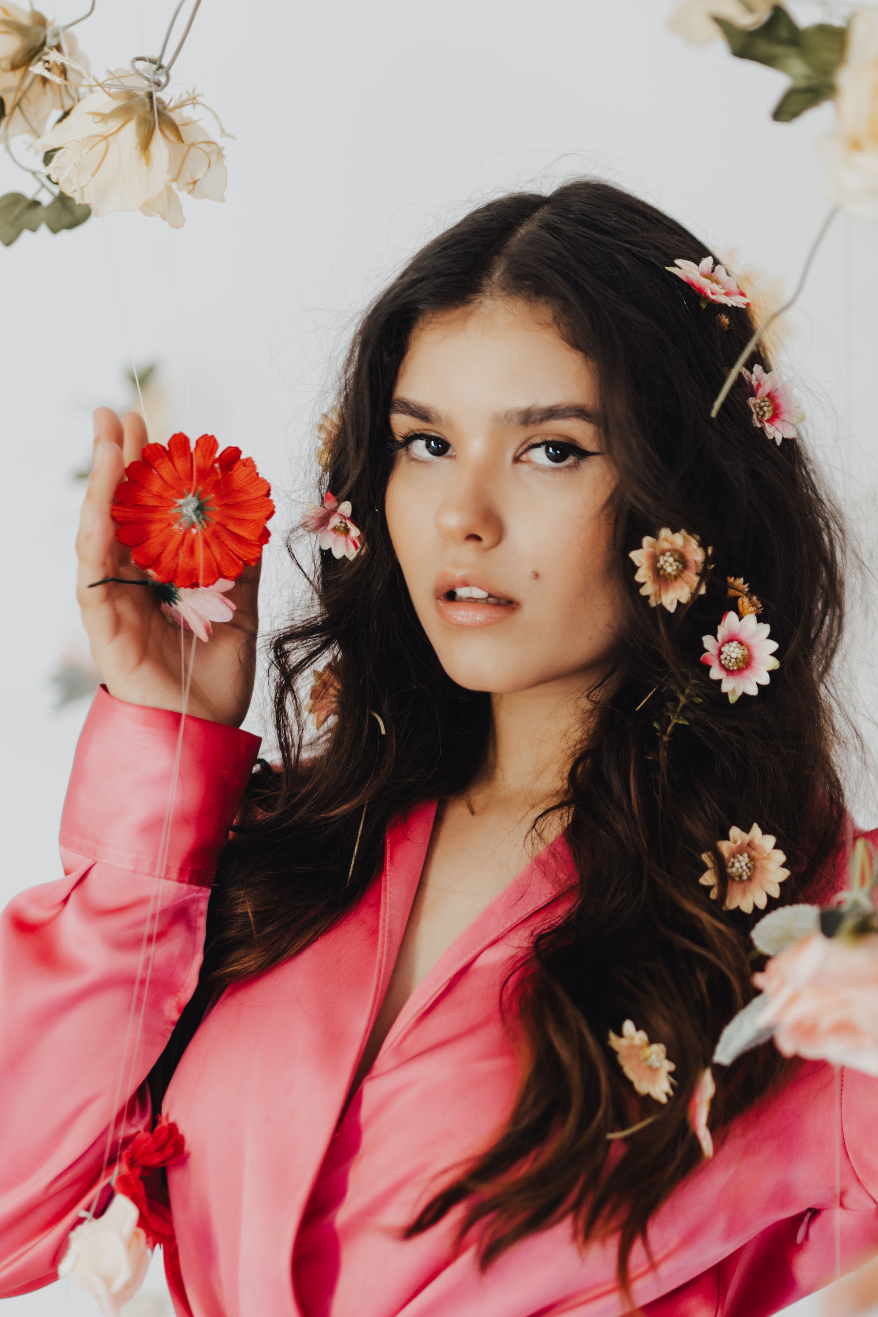 Portrait of a Woman with Flowers · Free Stock Photo
