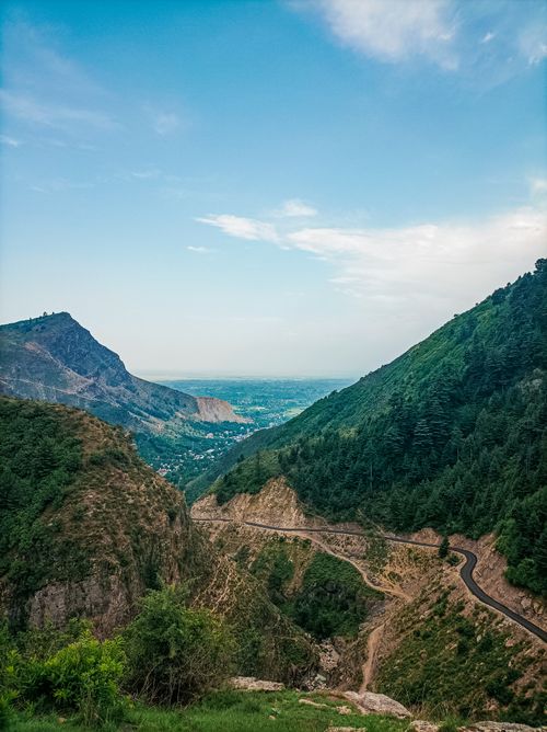 Free Discover the breathtaking mountainous terrain of Baramulla, showcasing lush green valleys and rugged hills. Stock Photo