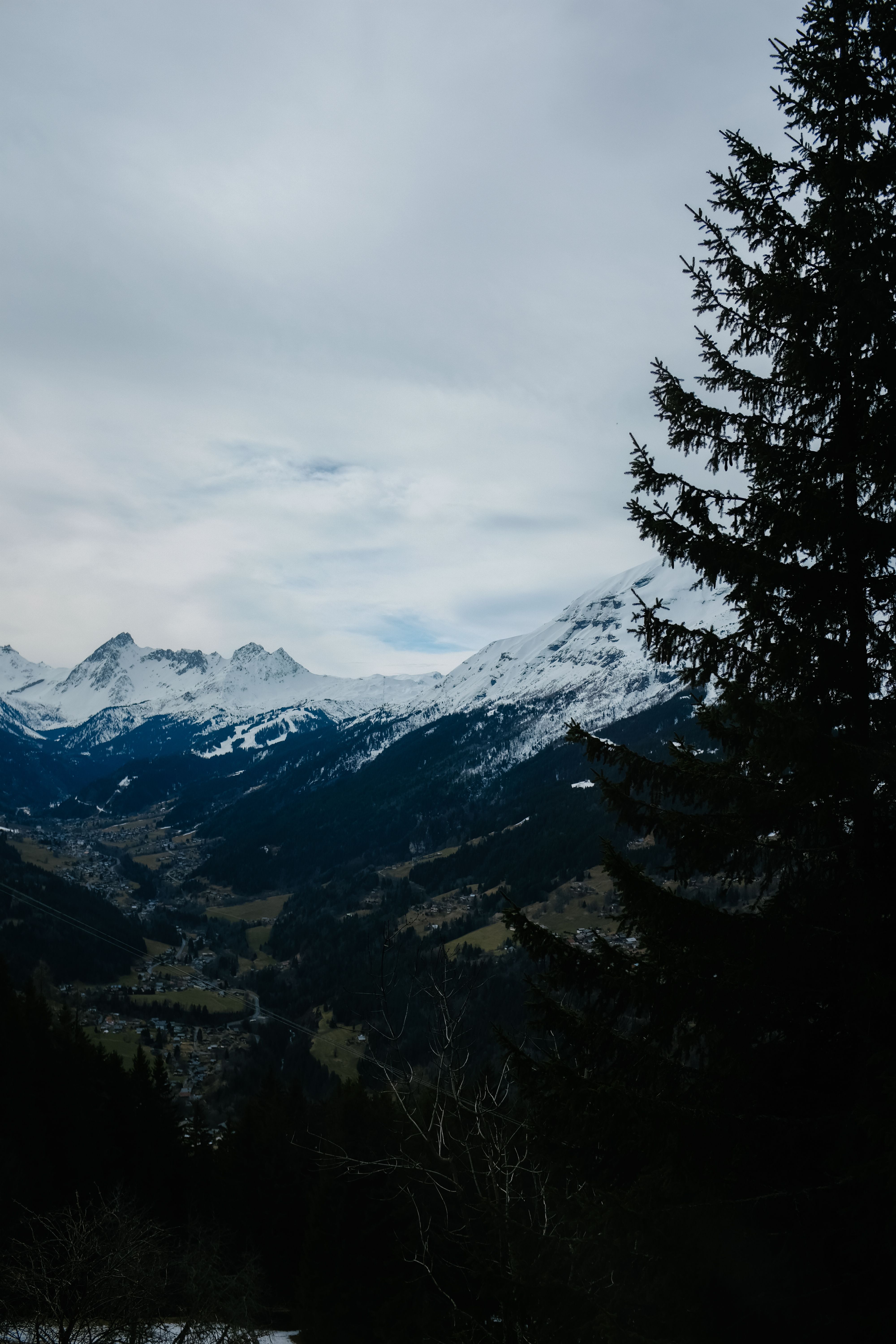 Mountain Range with Snow Capped Peaks · Free Stock Photo