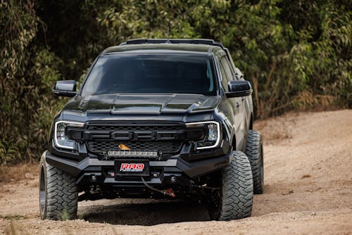 Black 4x4 Ford Driving Off Road