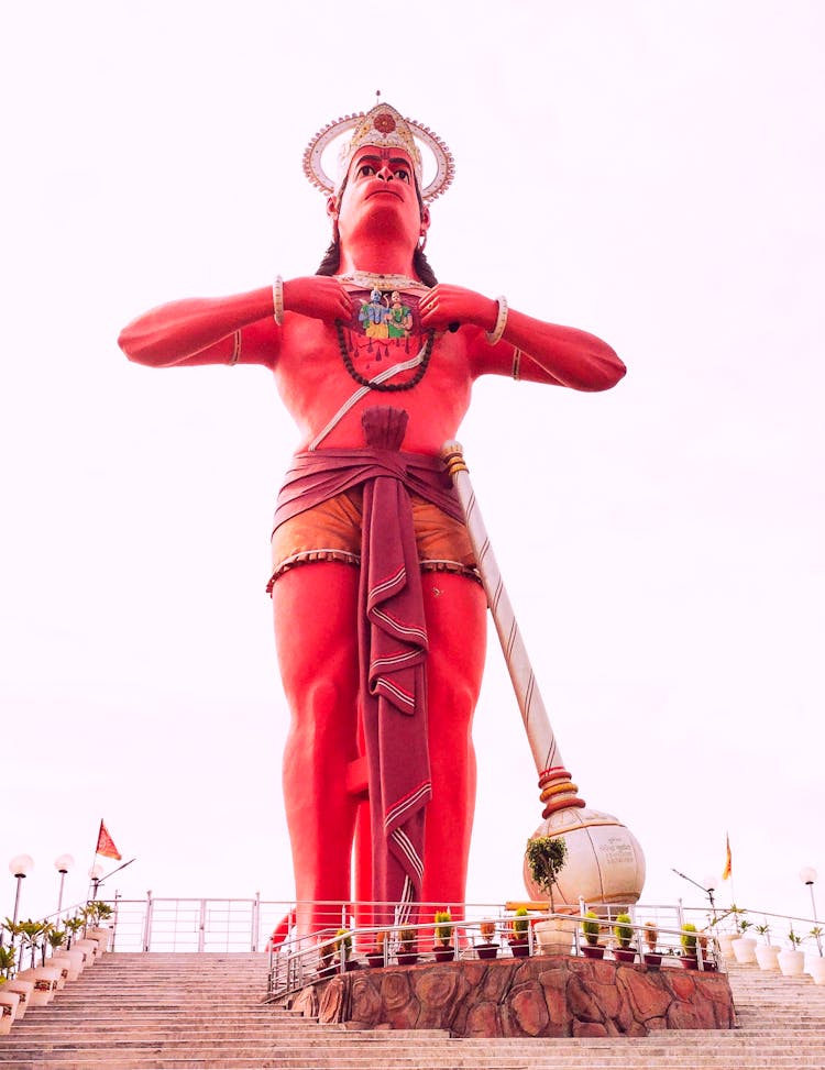 A Red Statue In A Temple In India