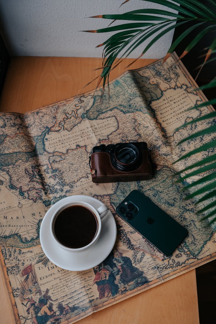 Still Life With Vintage Map And Camera