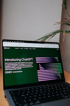 Photo by Hatice Baran OpenAI ChatGPT introduction on a laptop screen with focus on new AI features.