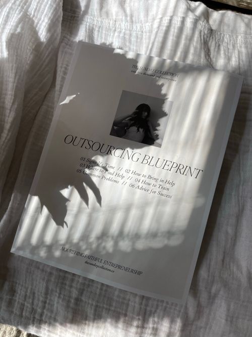 Free A blueprint document with shadows on fabric, depicting outsourcing concepts. Stock Photo