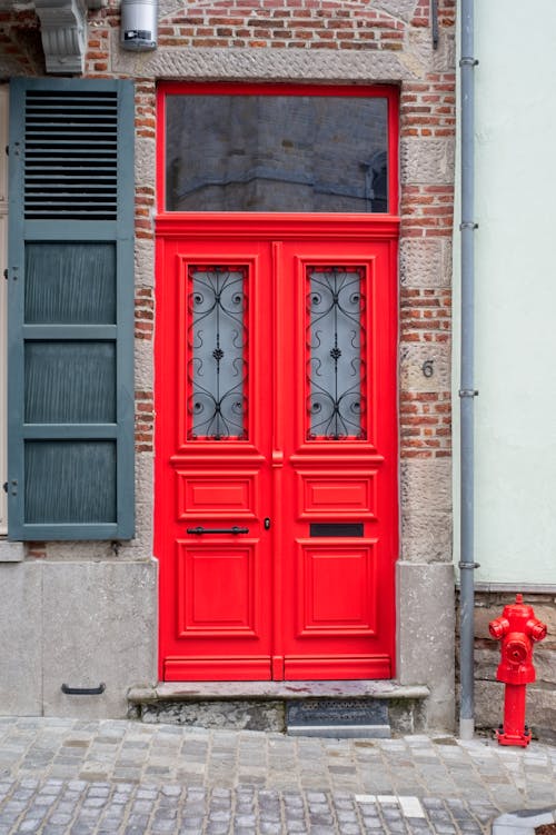 Red Old Doors to Brick Building
