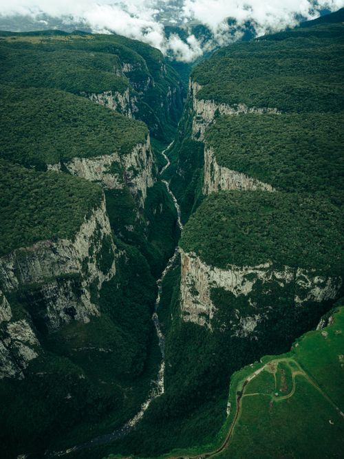 Free Discover the breathtaking expanse of Itaimbezinho Canyon in Cambará do Sul, Brazil from above. Stock Photo