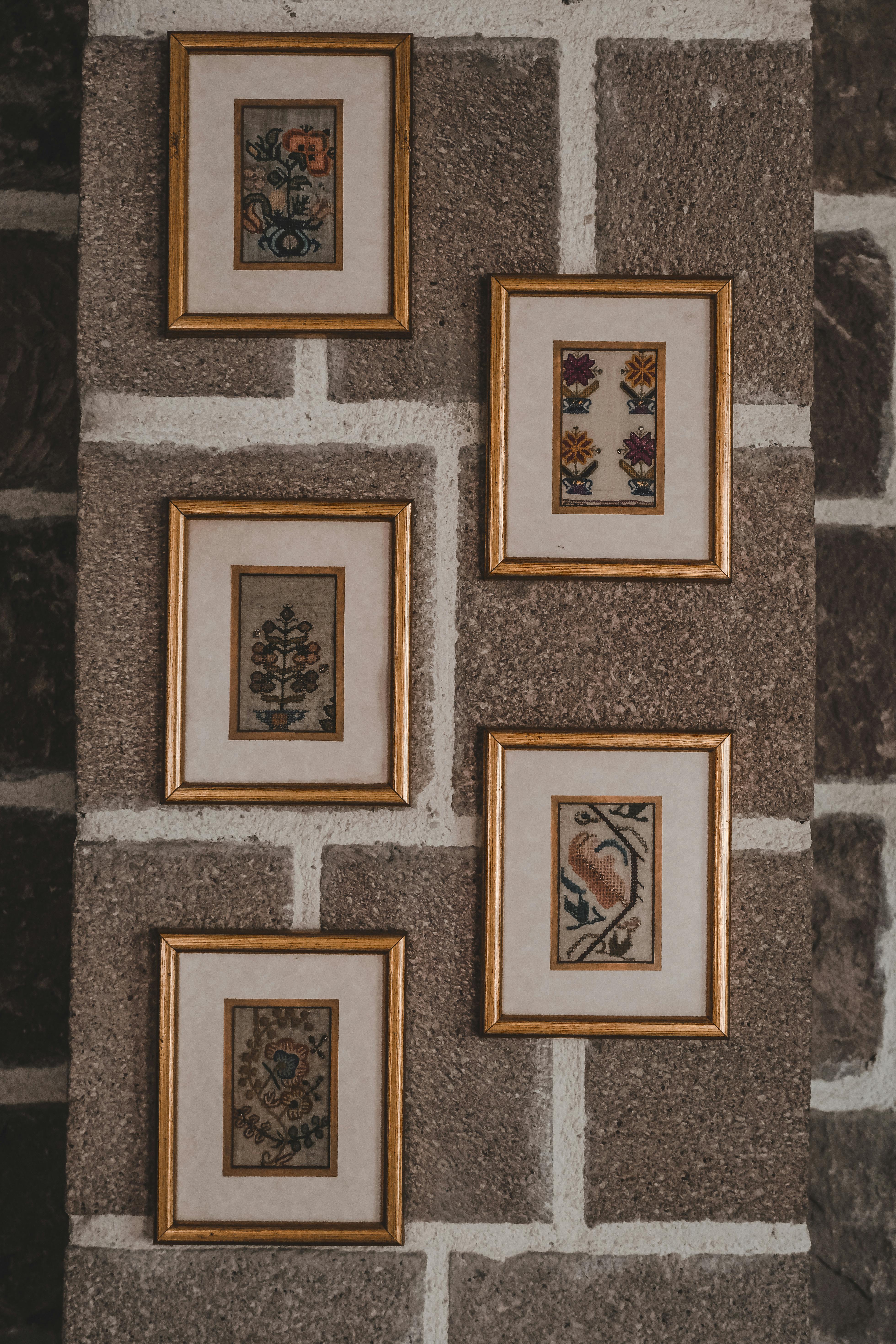 images of flowers in frames on wall