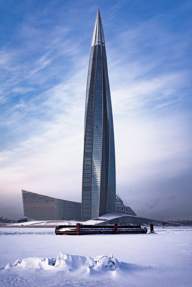 Modern Glass Building In Winter Landscape