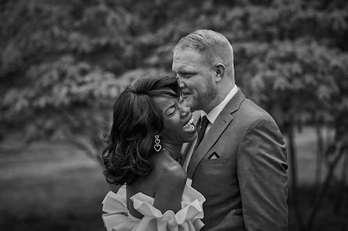 Black and White Photograph of a Wedding Couple in a Park