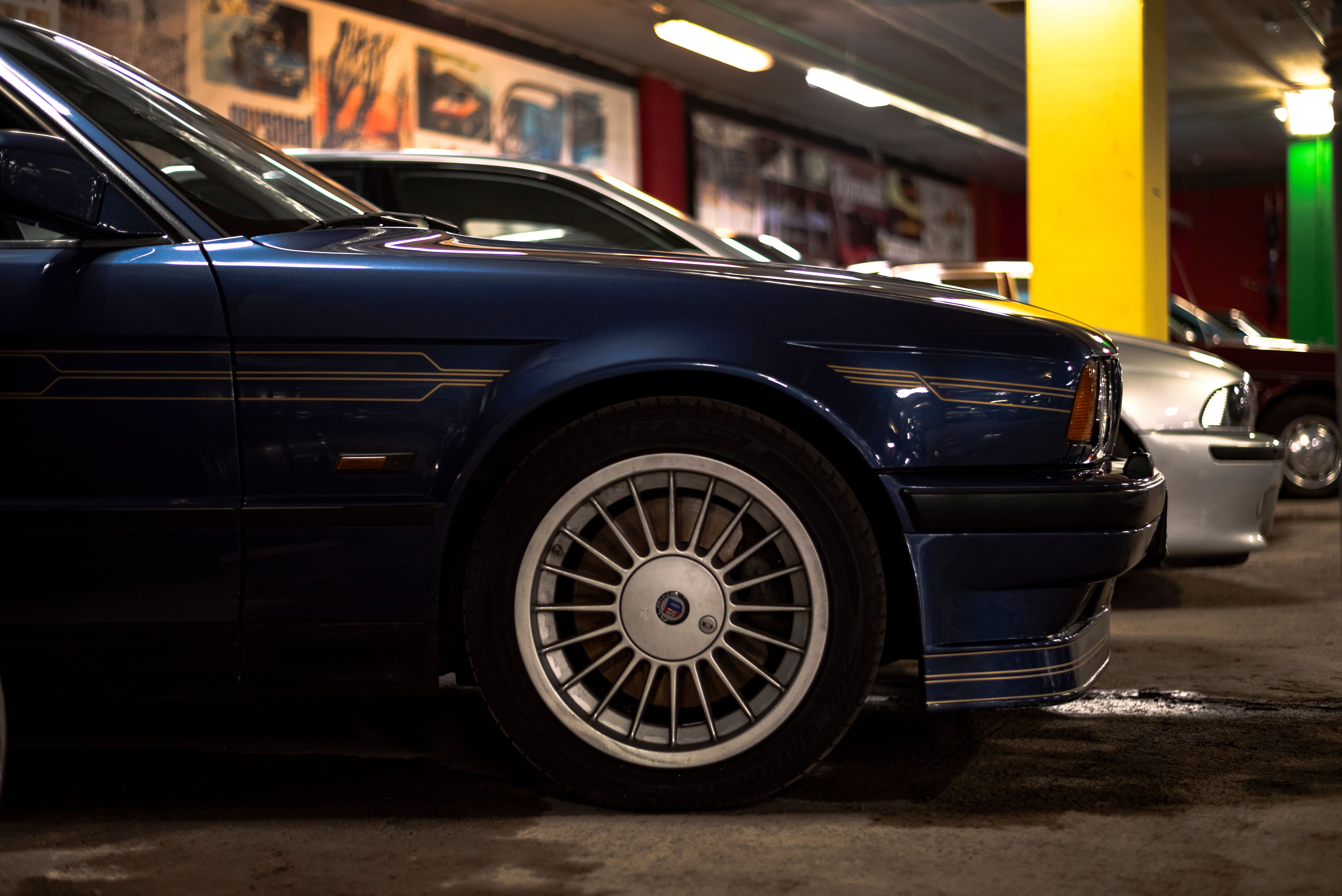 Dark Blue BMW and Cars Parked behind · Free Stock Photo