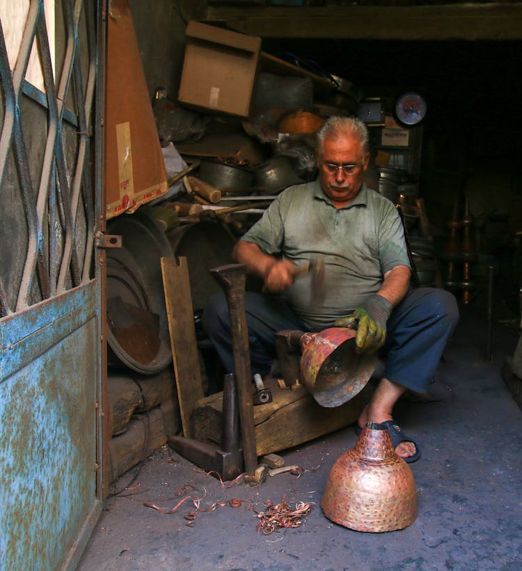 Tinsmith At Work In His Shop