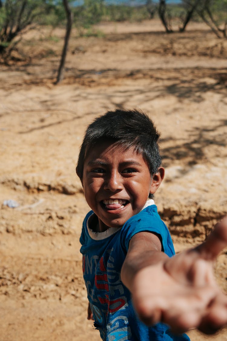 Boy Reaching Out