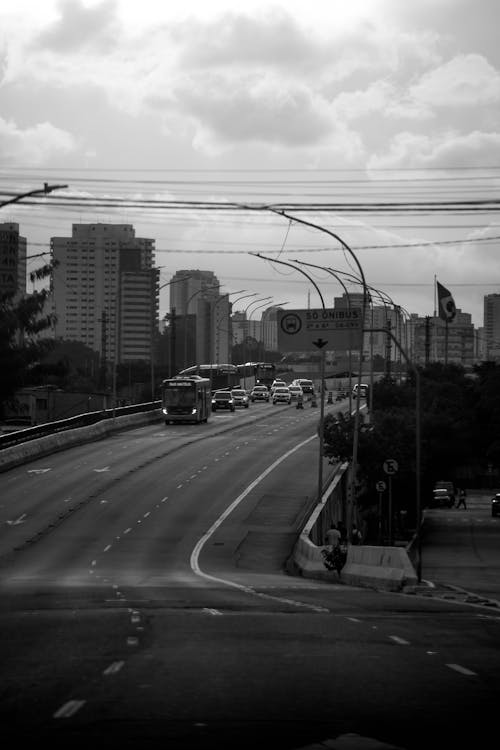 Clouds over Highway in City in Black and White
