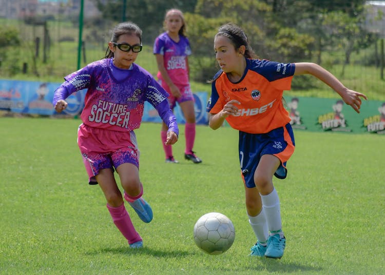 Teenagers Playing Football