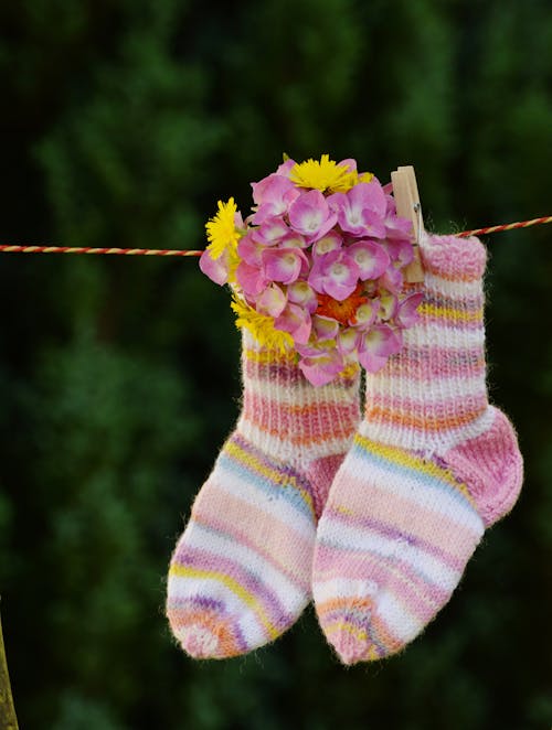 Pink and White Sock With Pink Flower Hanging