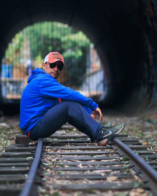 Man Posing on Railway