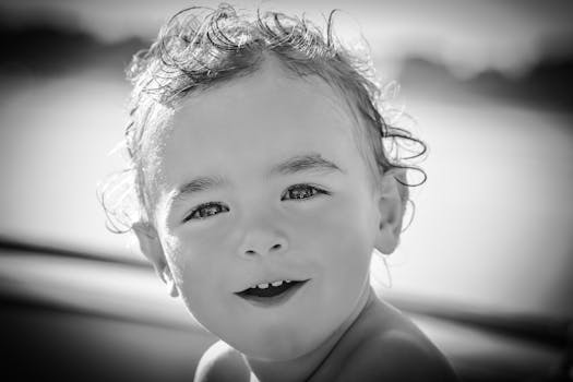 Baby Girl Smiling Grayscale Photo