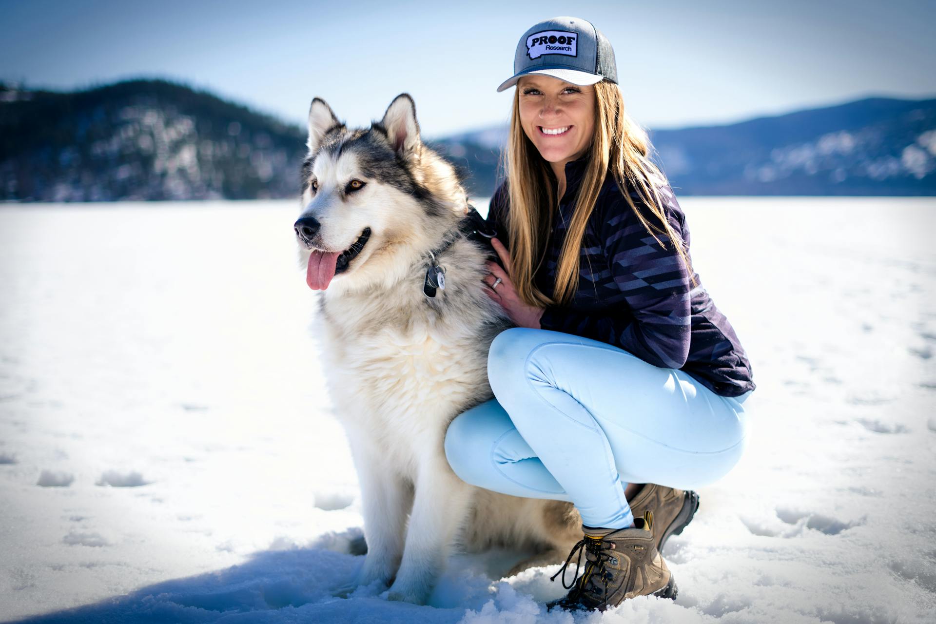 Smiling Proud Owner of Siberian Husky with Her Dog