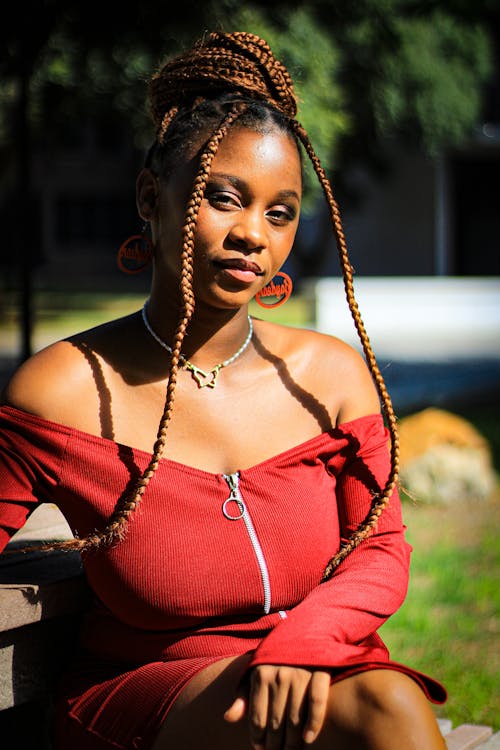 Woman with Braided Hair in Red Dress