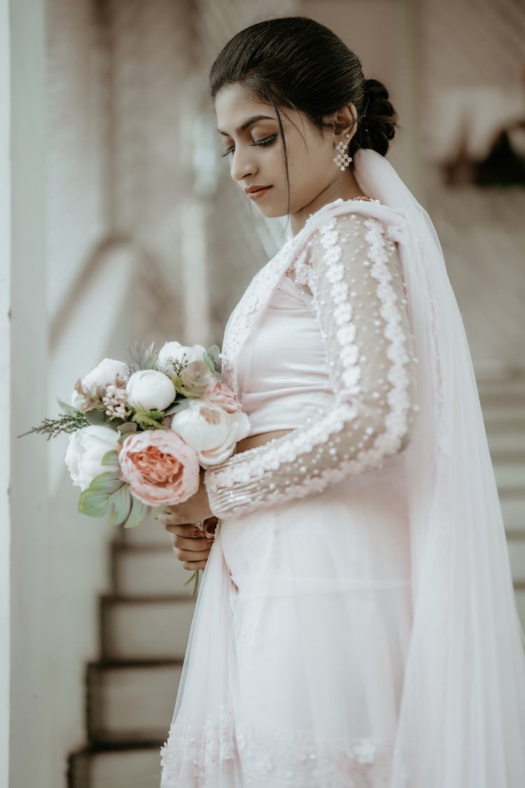 Bride In Wedding Dress With Bouquet