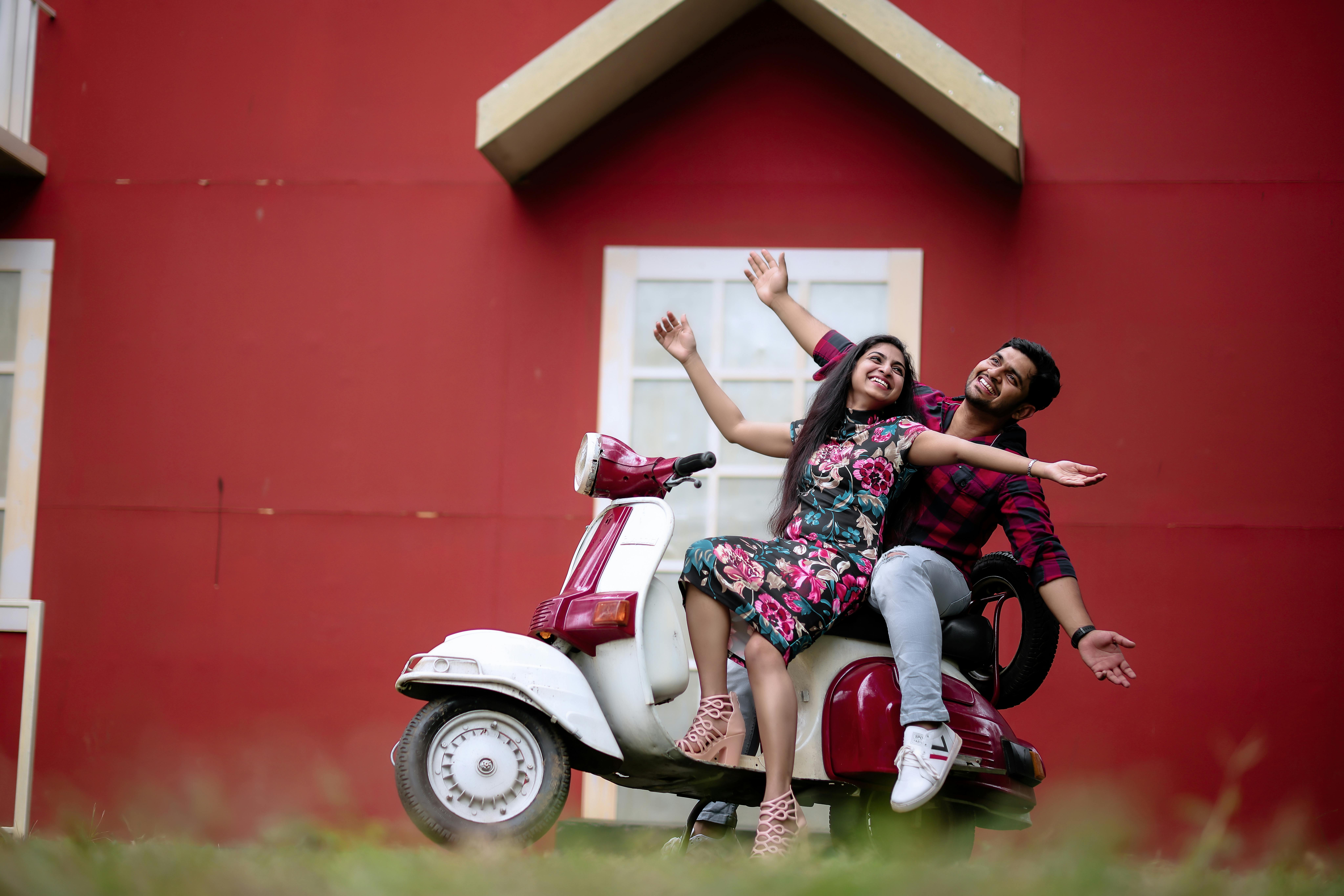 Couple Posing On The Street, Siting On Scooter , Wearing Stylish Casual  Clothes. Stock Photo, Picture and Royalty Free Image. Image 77275398.