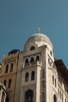 A stunning example of Ottoman architecture at Legacy Ottoman Hotel in Istanbul under clear blue skies.