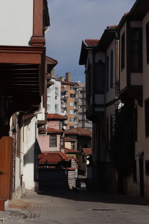 Free Explore the quaint, narrow streets of historic Ankara, Türkiye, capturing the charm of urban residential architecture. Stock Photo