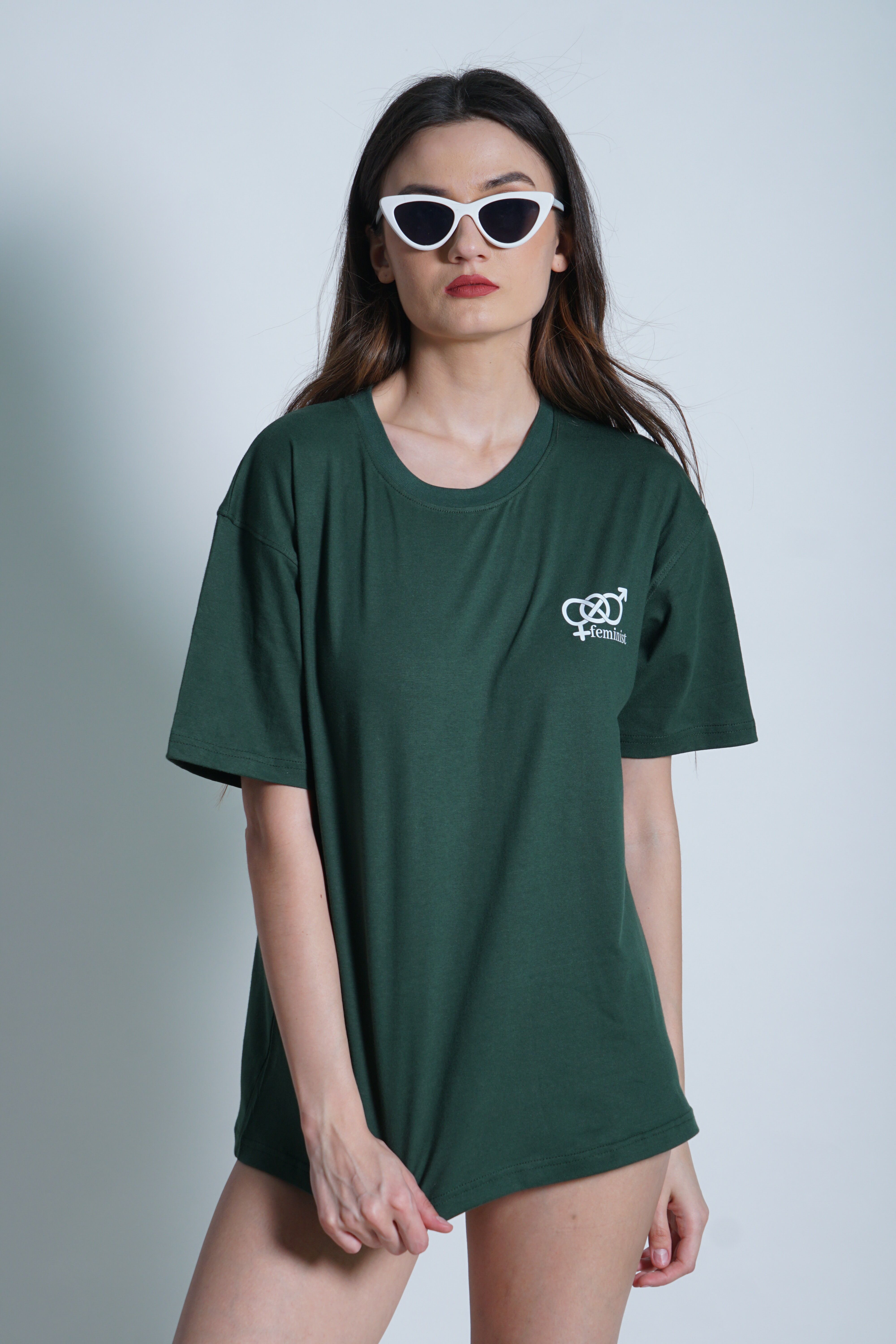Woman Posing in Sunglasses and Green T-Shirt · Free Stock Photo