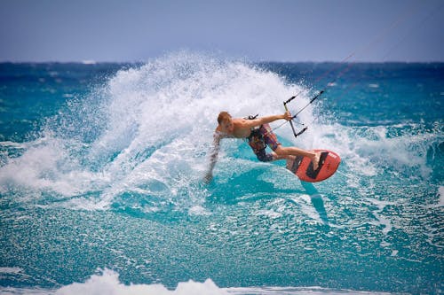 Free Man Kite Surfing Stock Photo