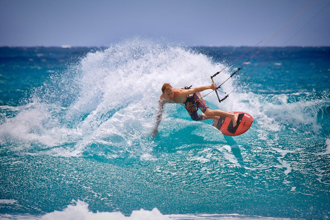Free Man Kite Surfing Stock Photo