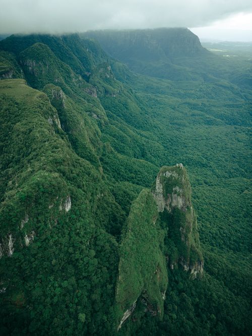 Free A breathtaking aerial shot of green landscapes and rock formations in Urubici, Brazil. Stock Photo