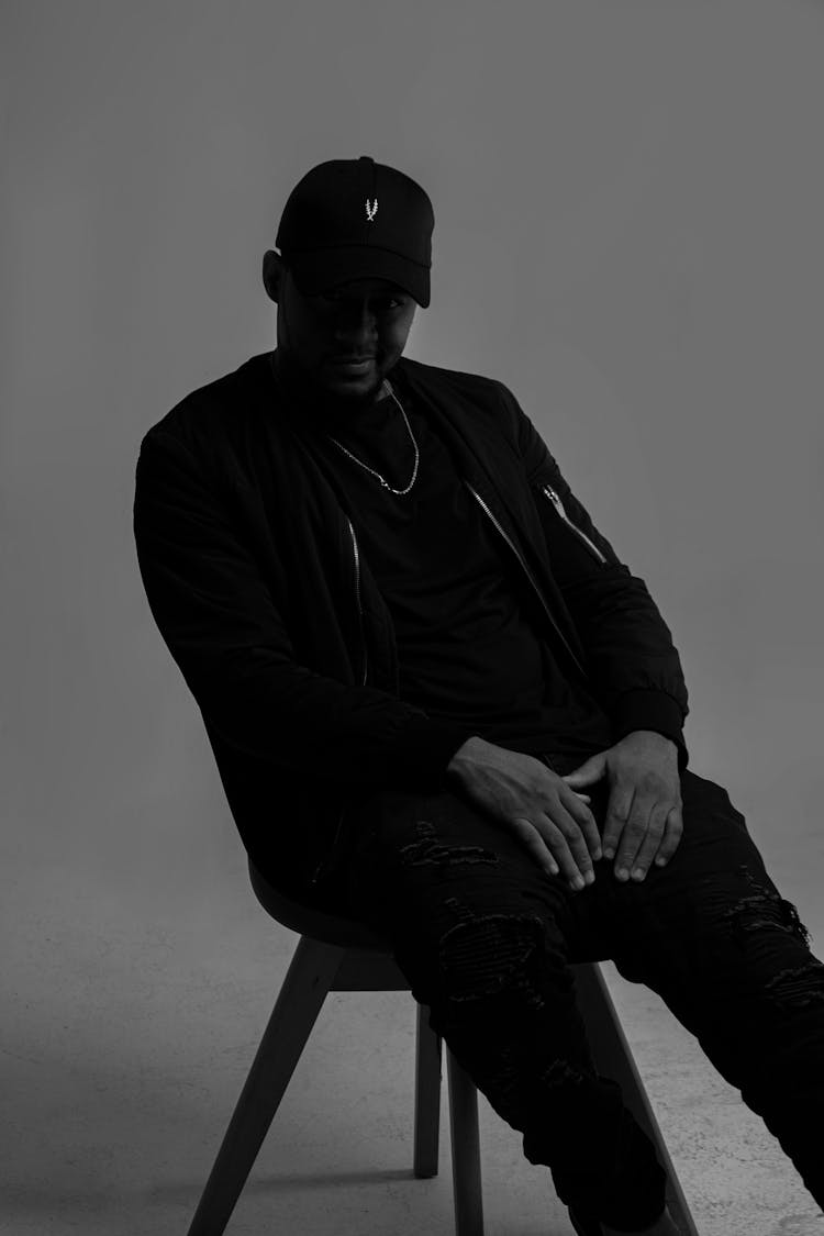 Man Posing, Sitting On Chair