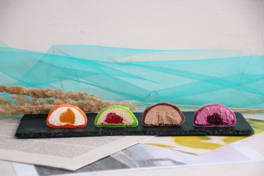 Mochi Cakes in Different Flavors Cut in Half 