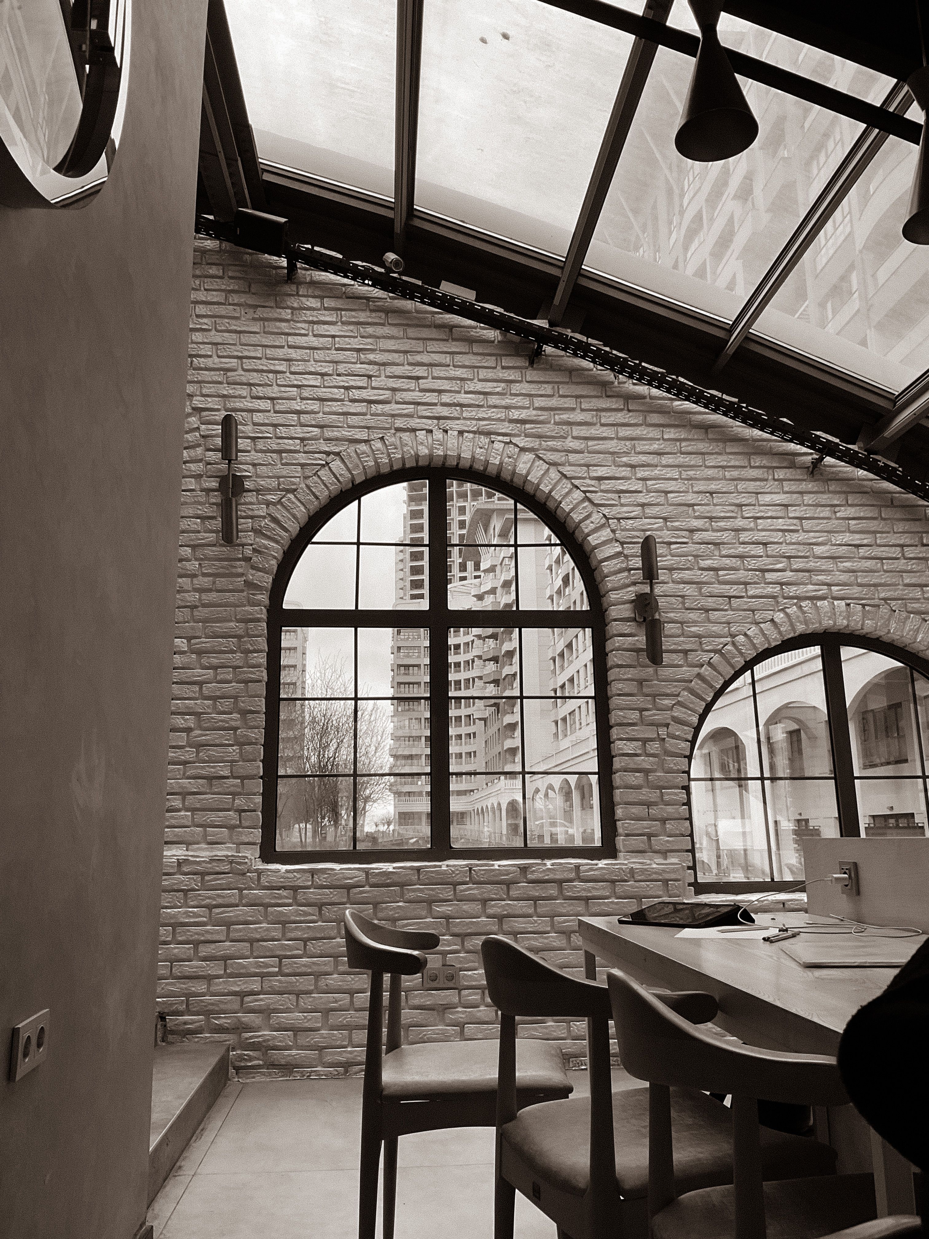A stylish loft in Ankara, Türkiye, featuring large windows and brick walls for an industrial feel.. pexels, stylish, loft