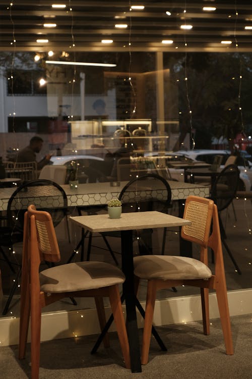 Empty Table by a Window in a Restaurant 