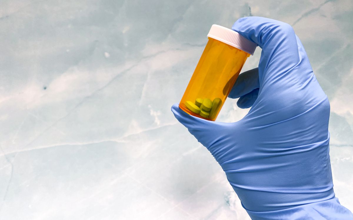 Prescription medication bottle representing medication support in recovery