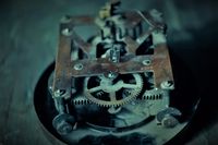 Aged brass detail of the escapement. Photo by dof pinhole on Pexels