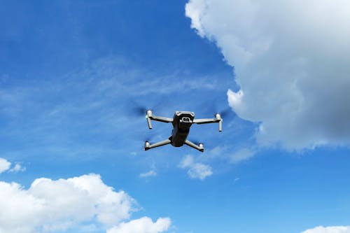 A DJi Air 2s Drone is Flying and Beautiful Clouds on the Background at Sharpenhoe Clappers Luton, England UK. Image was Captured on 22-March-2023.