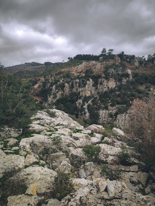 Clouds over Rocks on Hill