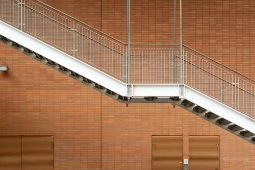 View of an Outdoor Metal Staircase Outside of a Building 