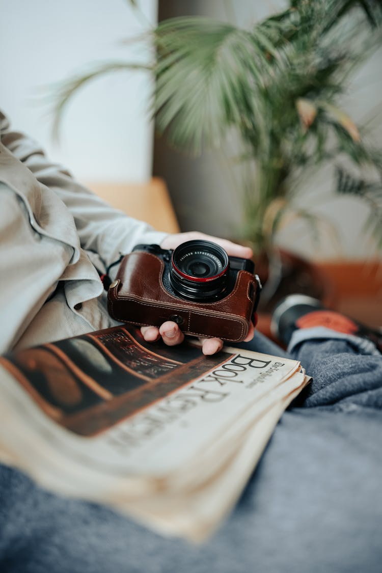 Person Holding Retro Analogue Camera