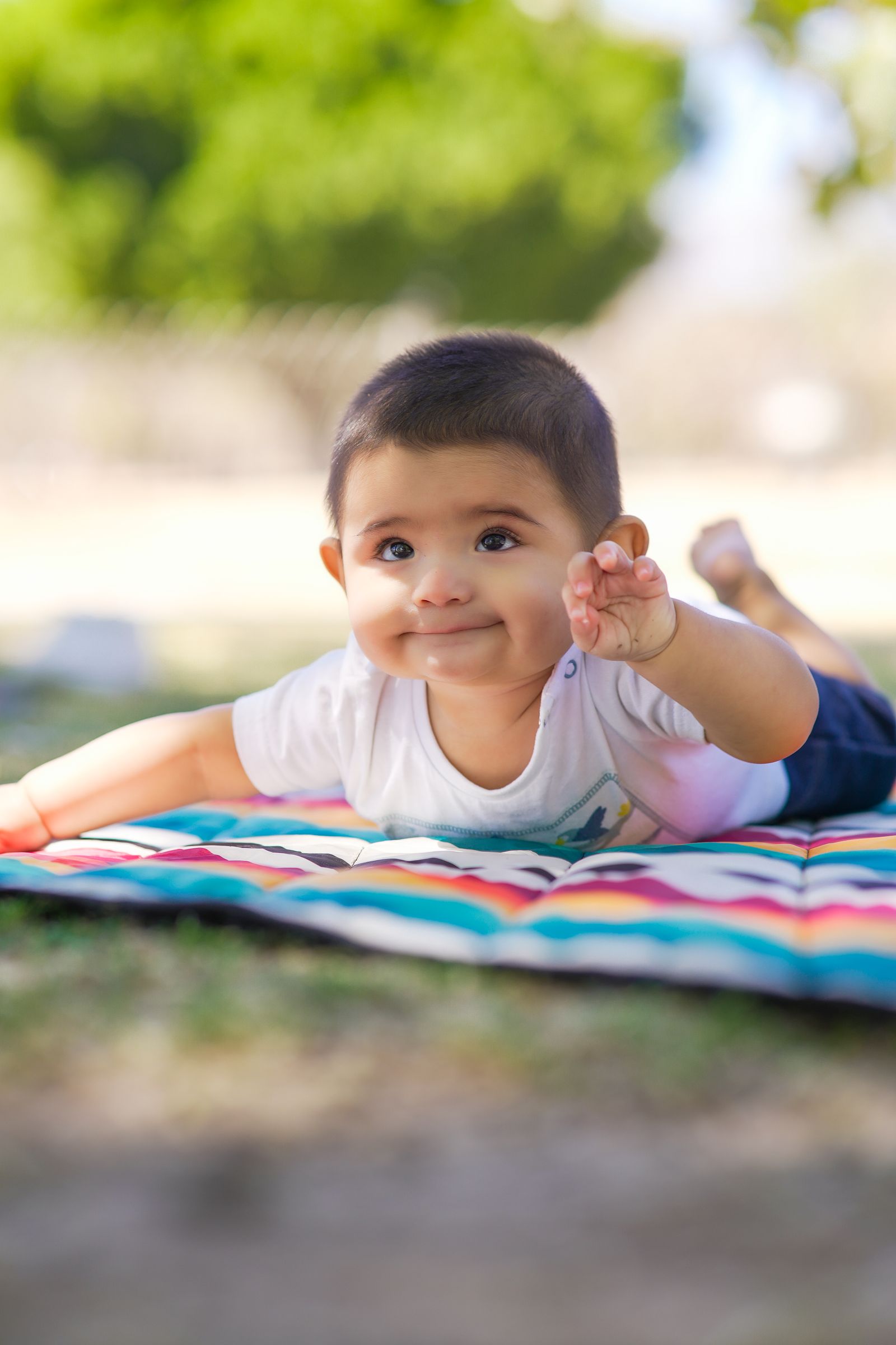 Smiling baby on a blanket