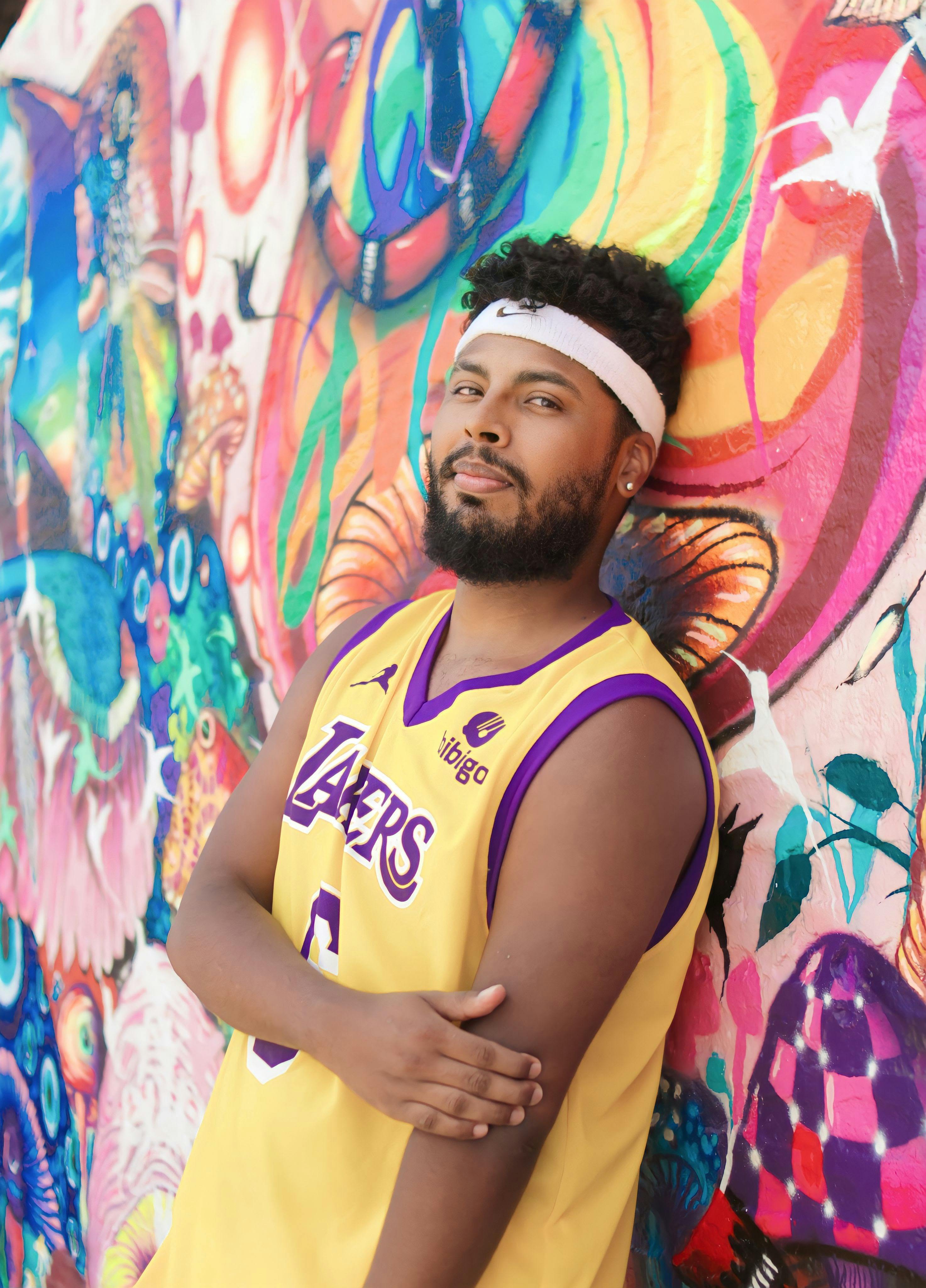 A Man in Sunglasses Wearing Lakers Jersey · Free Stock Photo