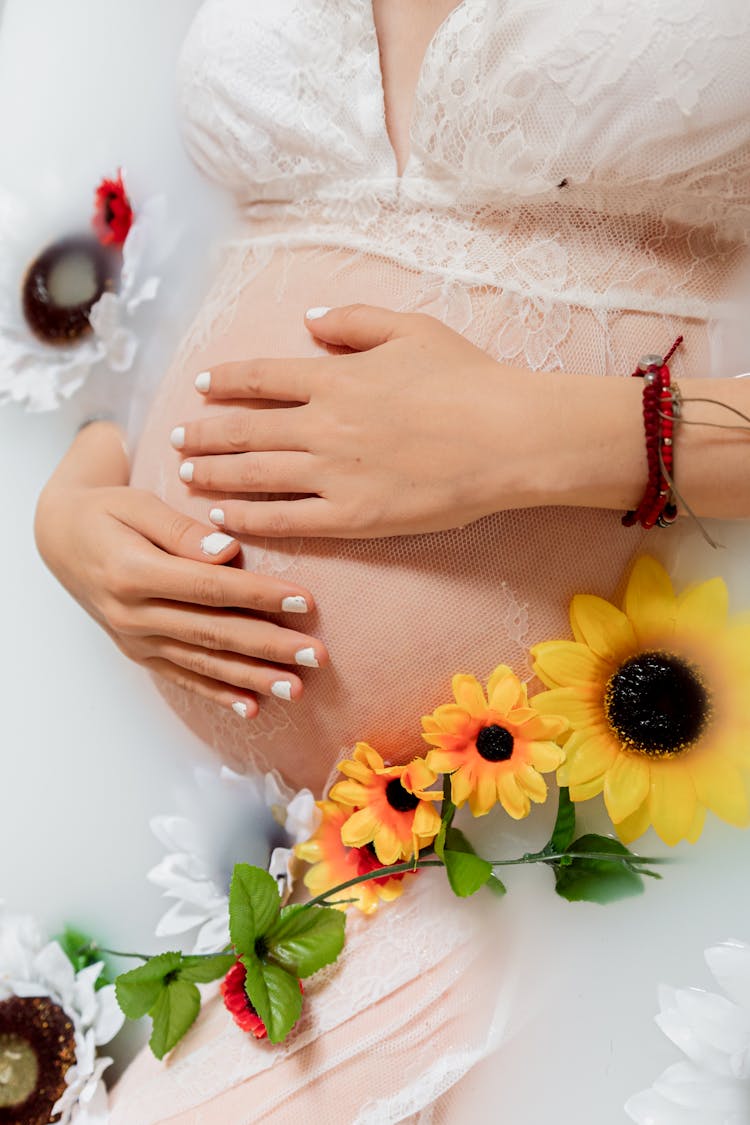 Hands On Stomach Of Pregnant Woman