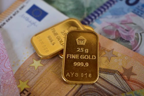 Gold Bars and Euro Banknotes 