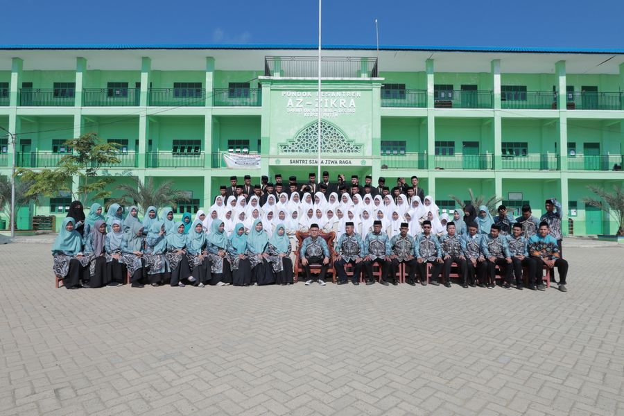 Students and teachers at an academy courtyard