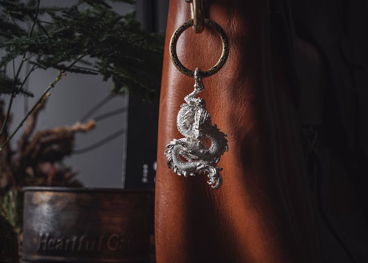 Close-up Of A Vintage Dragon Key Chain 