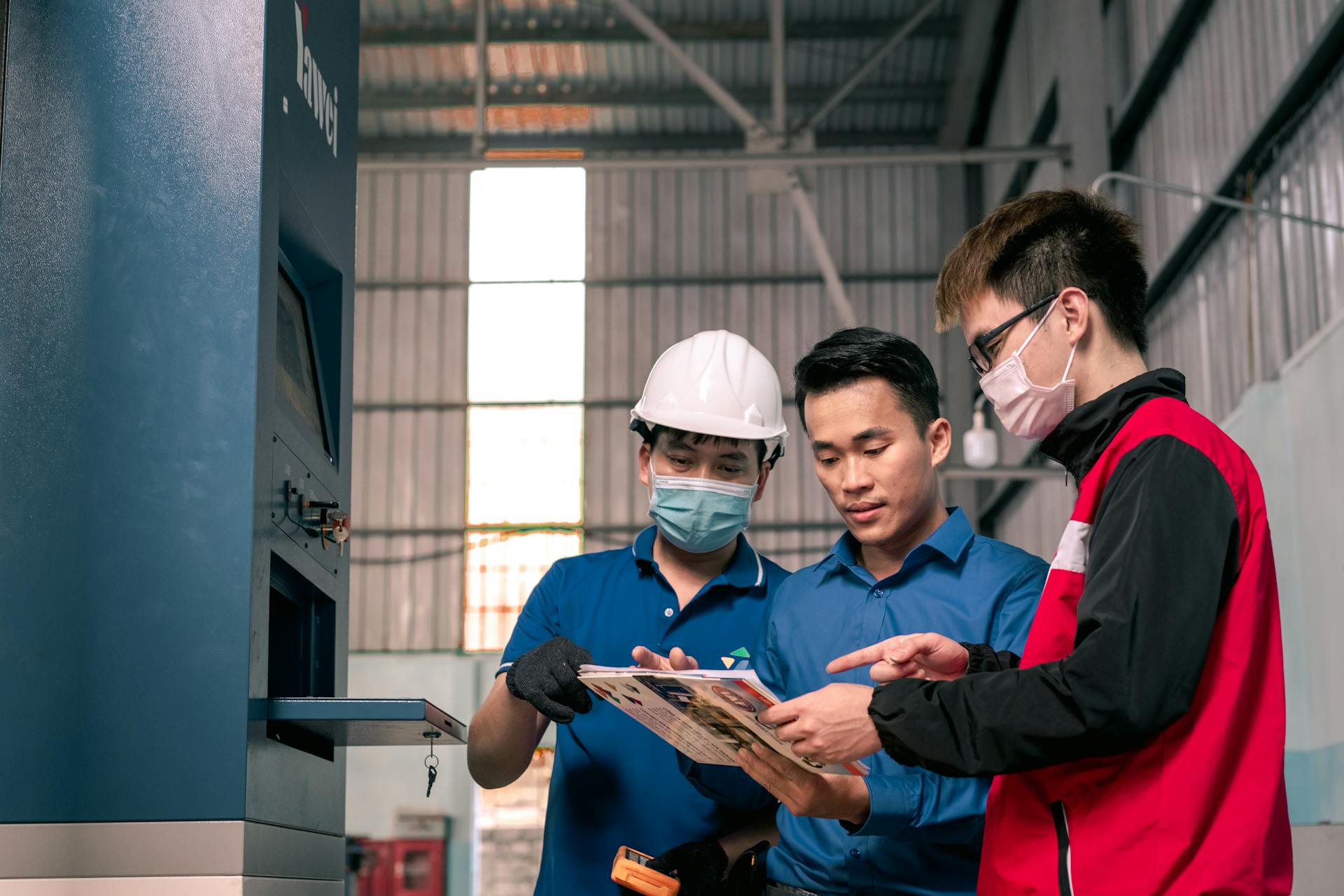Men in Masks and Helmet in Warehouse