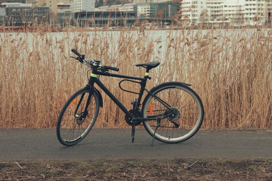 Scenic view of a bicycle on a lakeside path in Jönköping, Sweden during fall.