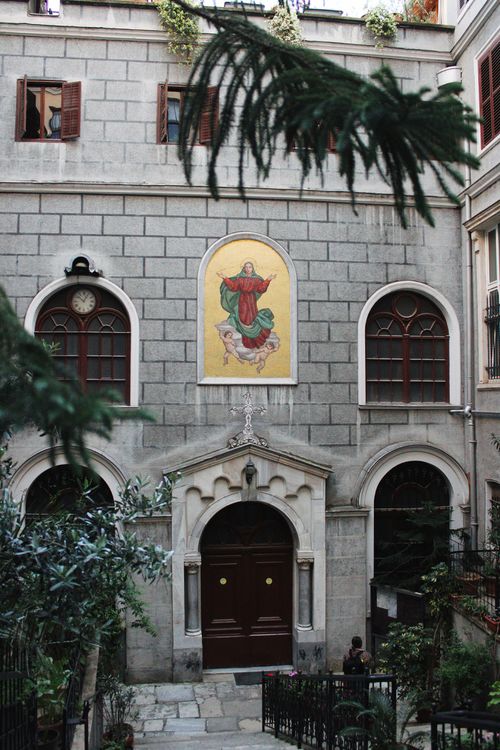 Free Facade of Saint Mary Draperis Church in İstanbul, featuring religious mural. Stock Photo